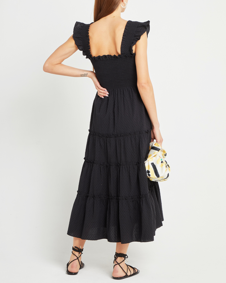Second image of Calypso Maxi Dress, a black maxi dress, swiss dot material, smocked bodice, ruffles cap sleeves