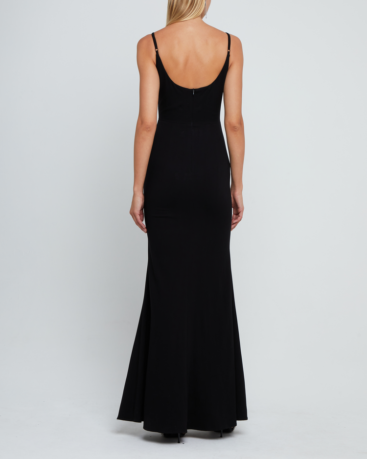 Second image of Balsam Dress, a black bridesmaid dress with deep v-neckline, adjustable straps, back zipper, low scoop back, and long skirt