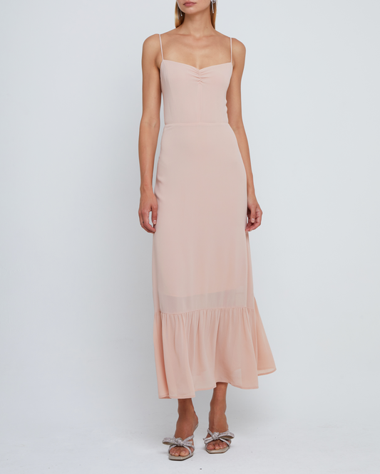 First image of Evelyn Dress, a pink bridesmaid maxi-length dress with ruched bust detail, sweetheart neckline, tiered skirt, back smocking, adjustable straps, back zipper, and lining