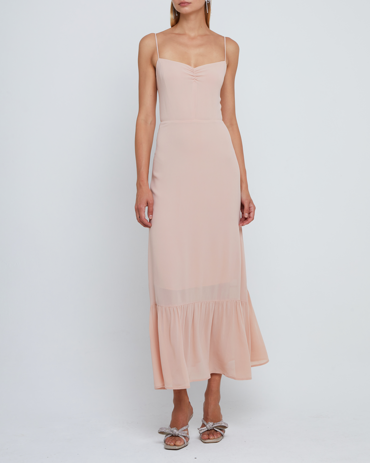 First image of Evelyn Dress, a pink bridesmaid maxi-length dress with ruched bust detail, sweetheart neckline, tiered skirt, back smocking, adjustable straps, back zipper, and lining